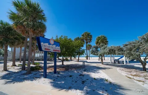 a view of pool with outdoor seating