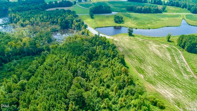 a view of a swimming pool with a yard