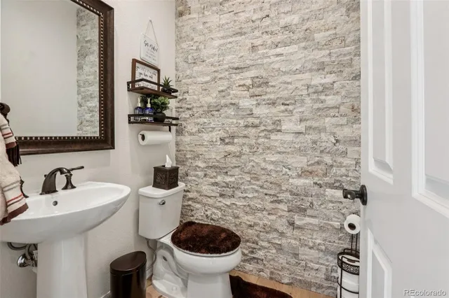 a bathroom with a sink and a toilet