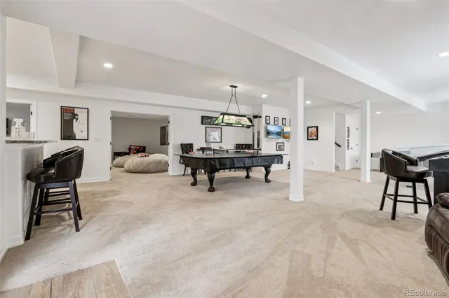 a living room with furniture and a table