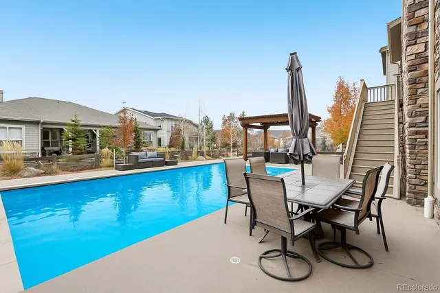 a view of a balcony with chairs