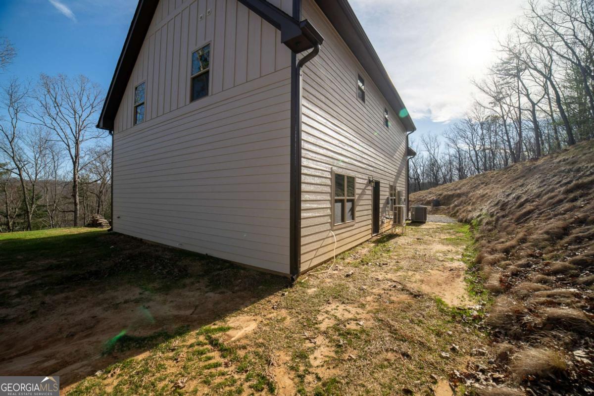 802 Mull Valley Road Morganton, GA 30560 - Photo 47 of 75 a view of a house with a yard