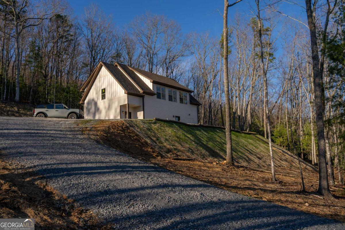 802 Mull Valley Road Morganton, GA 30560 - Photo 69 of 75 a view of a house with a yard