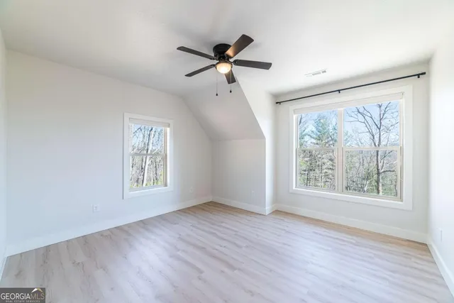 a view of lake with mountain