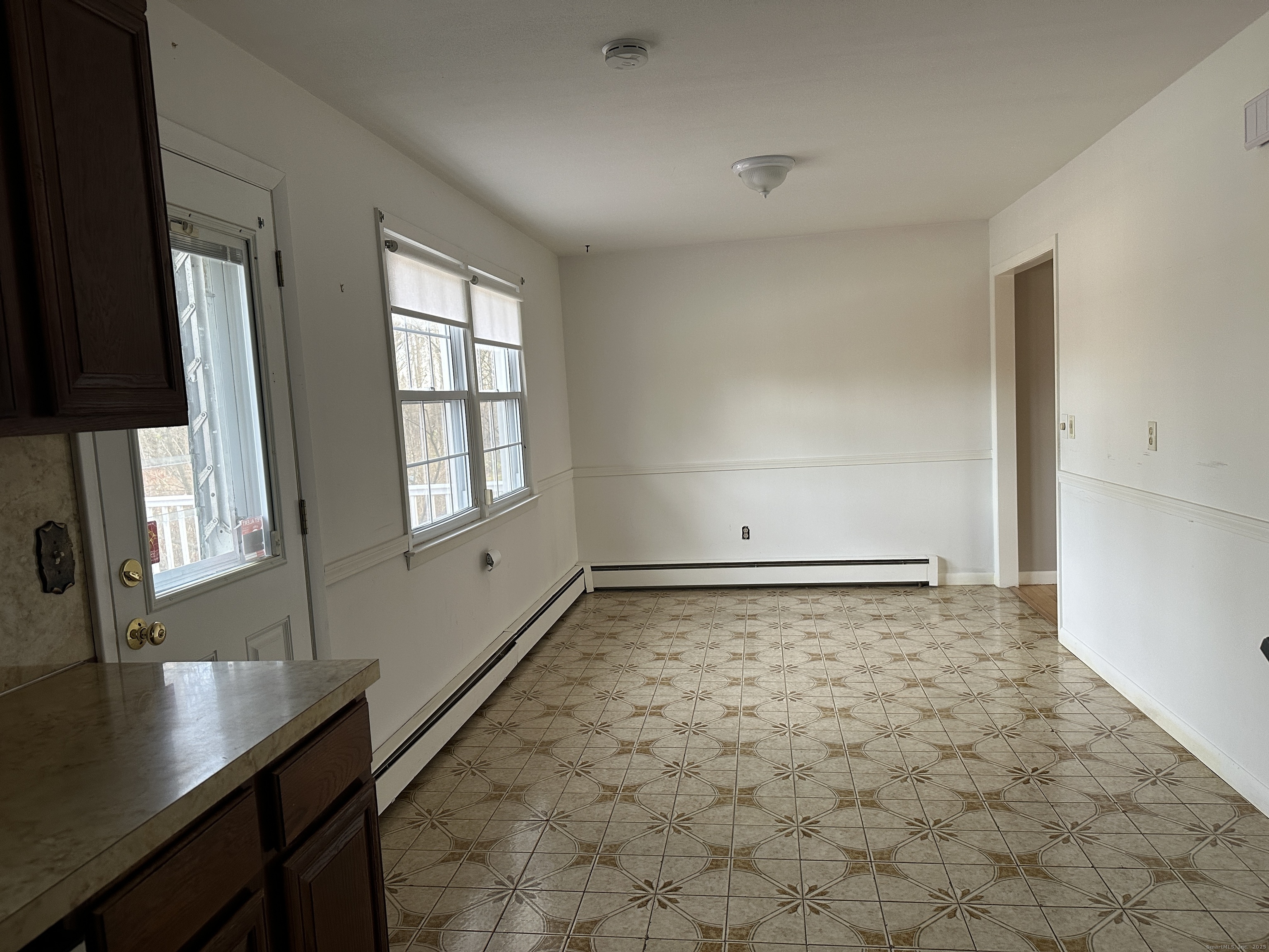 65 Gate Ridge Road Easton, CT 06612 - Photo 5 of 15 a view of an empty room and window