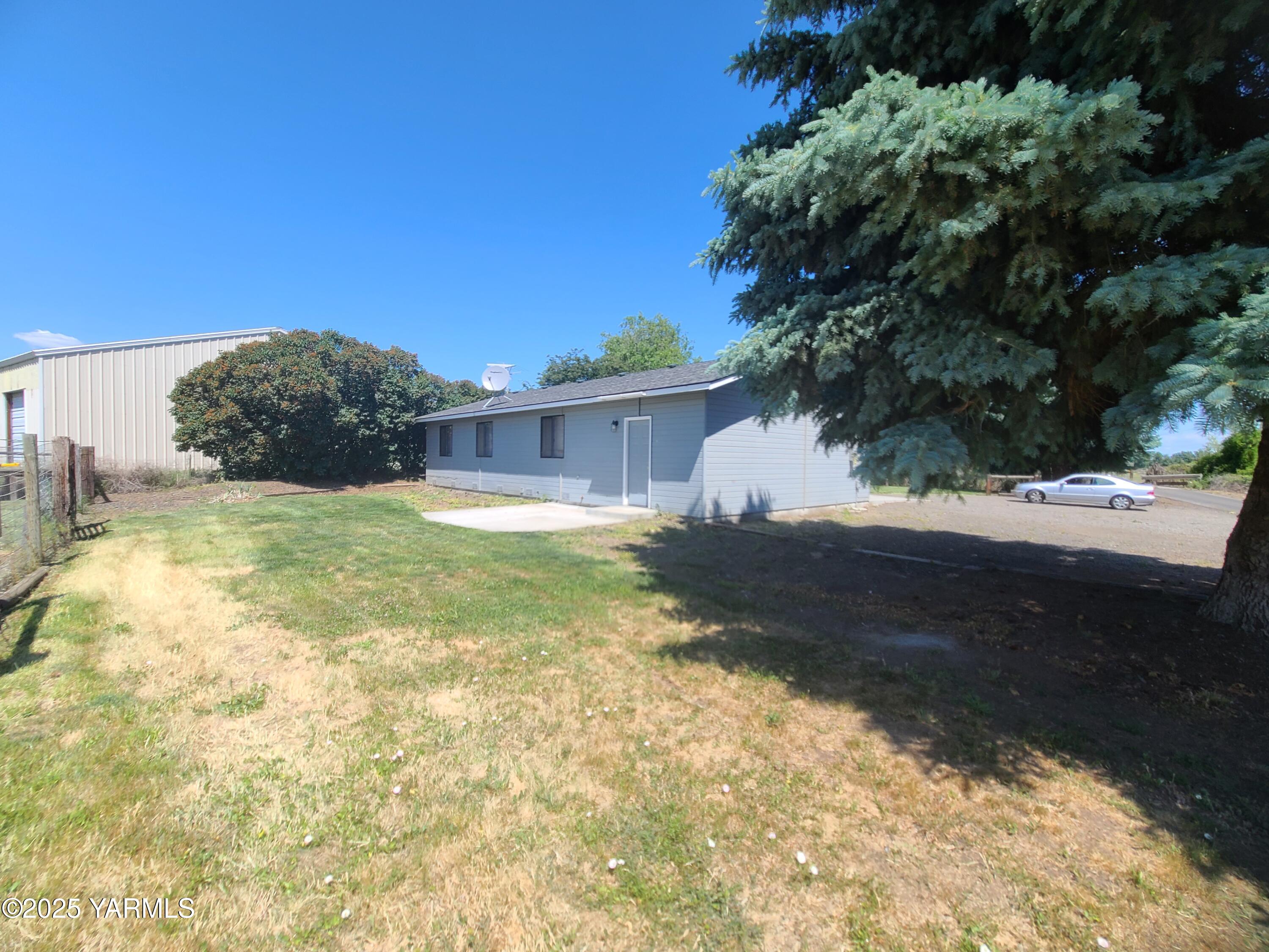 9509 Meadowbrook Road Yakima, WA 98903 - Photo 4 of 14 a view of a yard with an outdoor space