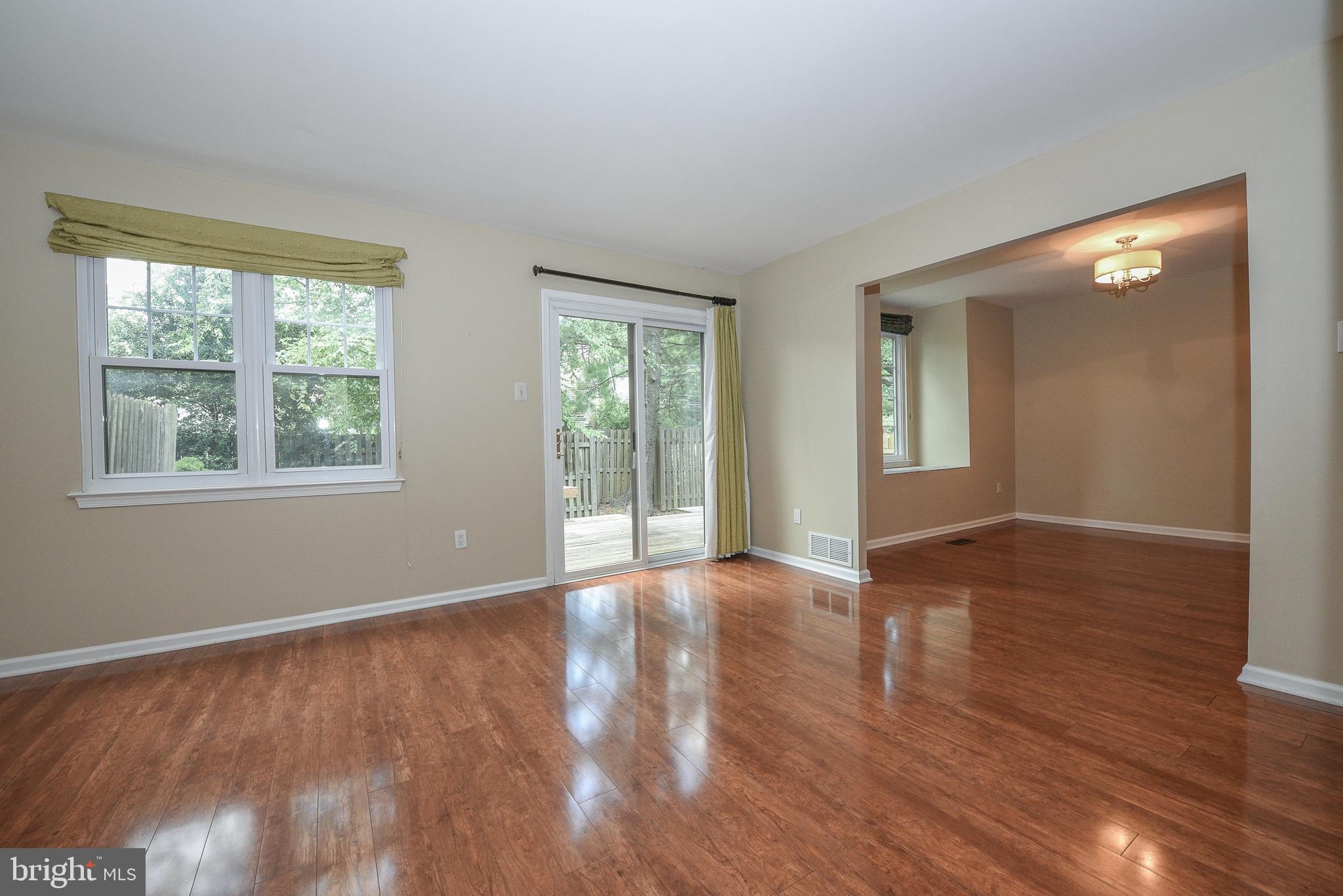 429 Eagle Road Wayne, PA 19087 - Photo 14 of 41 a view of an empty room with wooden floor and a window