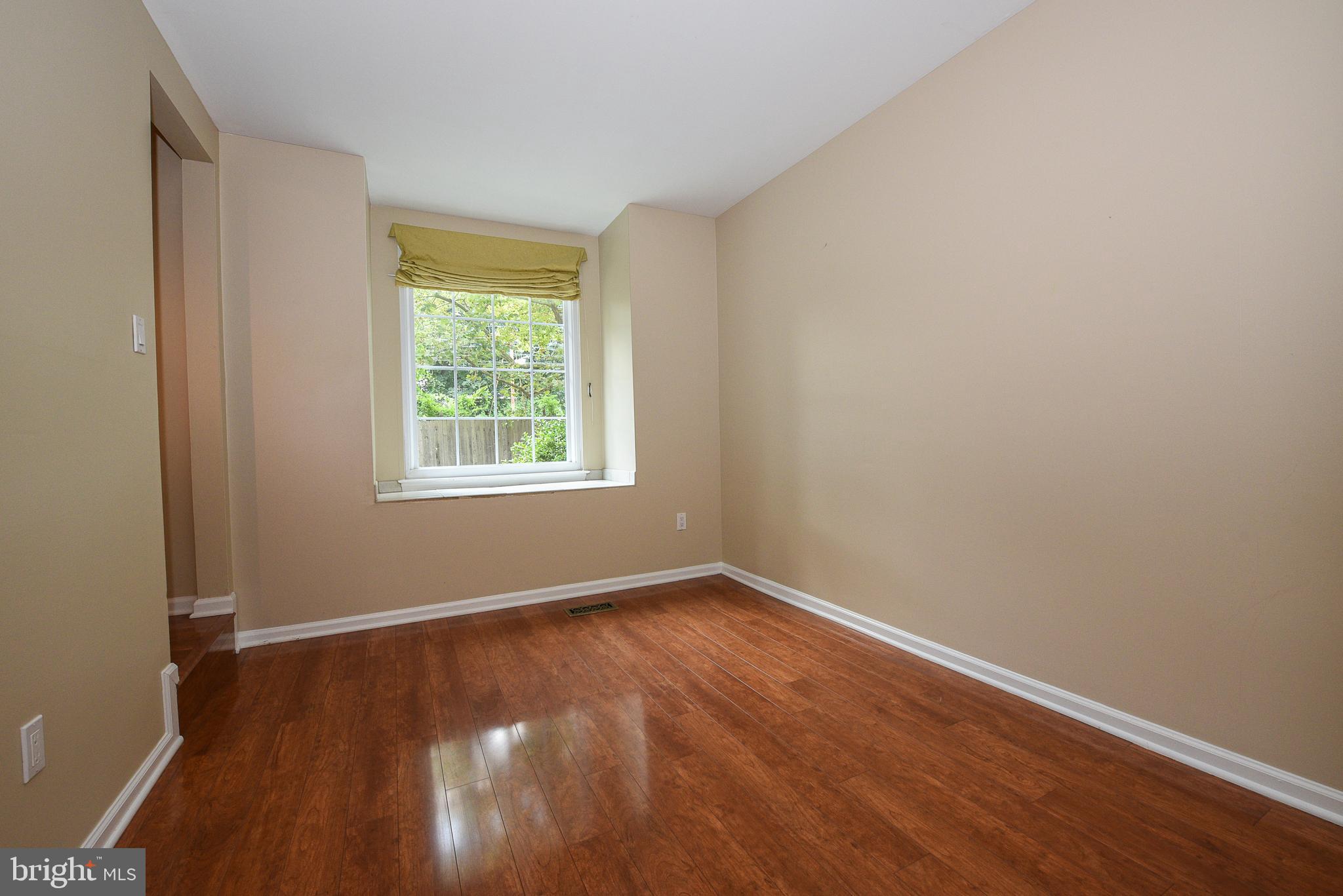 429 Eagle Road Wayne, PA 19087 - Photo 15 of 41 an empty room with wooden floor and windows