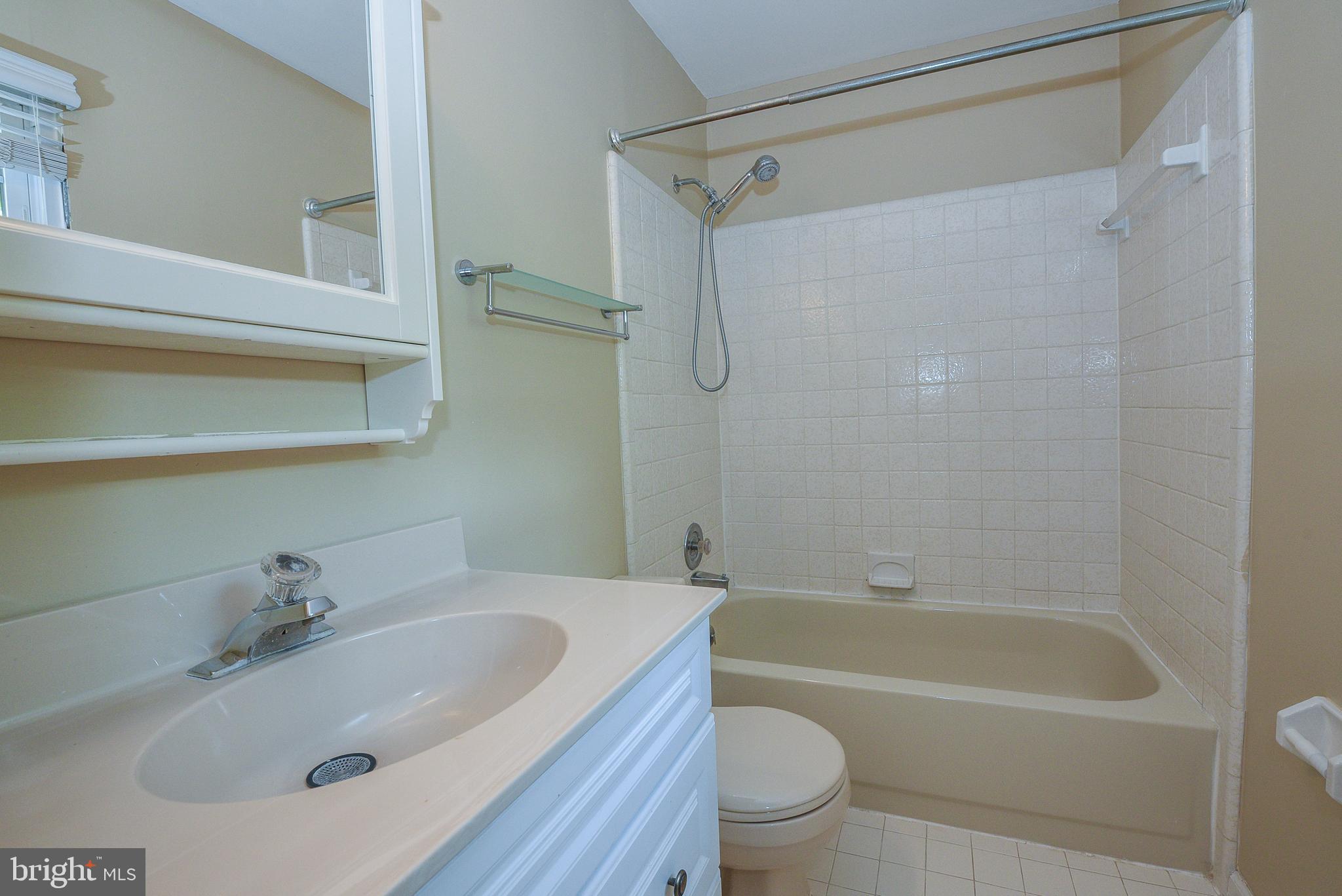 429 Eagle Road Wayne, PA 19087 - Photo 20 of 41 a bathroom with a sink a toilet and a bathtub