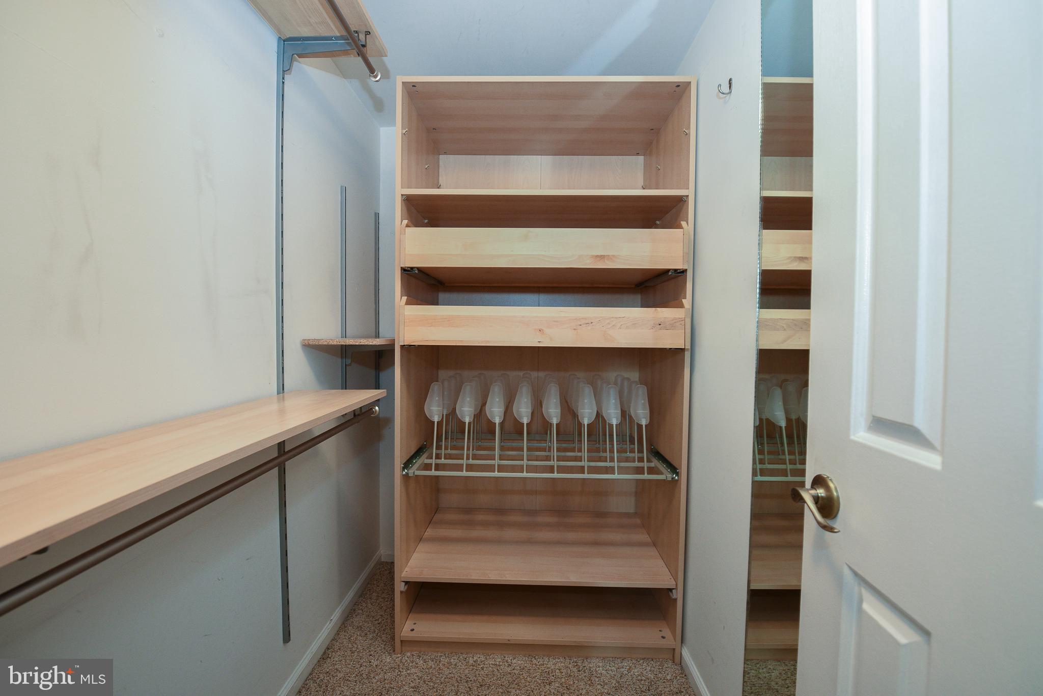 429 Eagle Road Wayne, PA 19087 - Photo 22 of 41 a view of walk in closet with empty racks