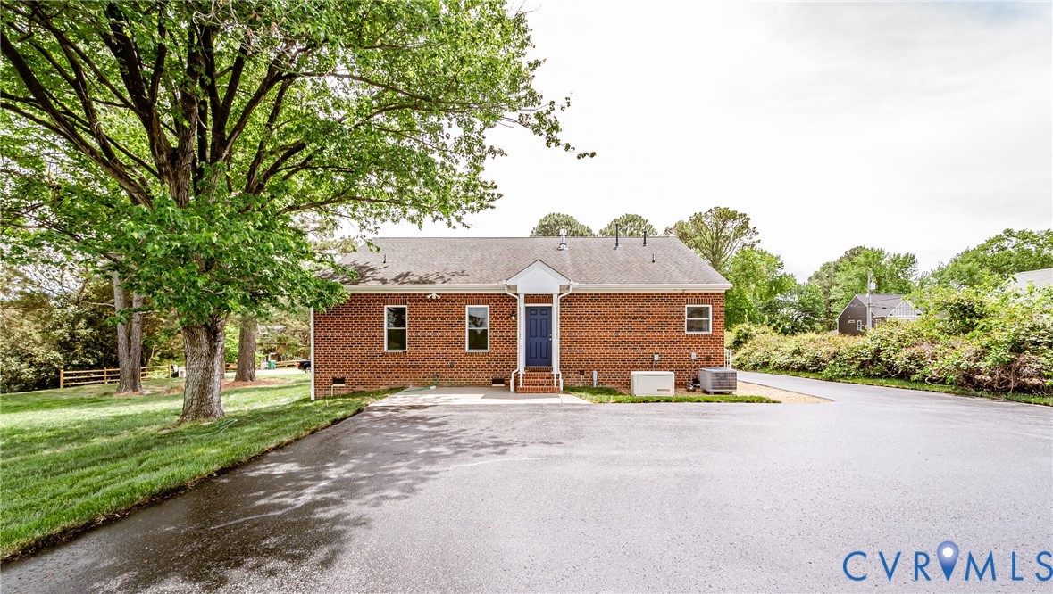 2018 Valentine Road Henrico, VA 23228 - Photo 50 of 65 front view of a house with a yard