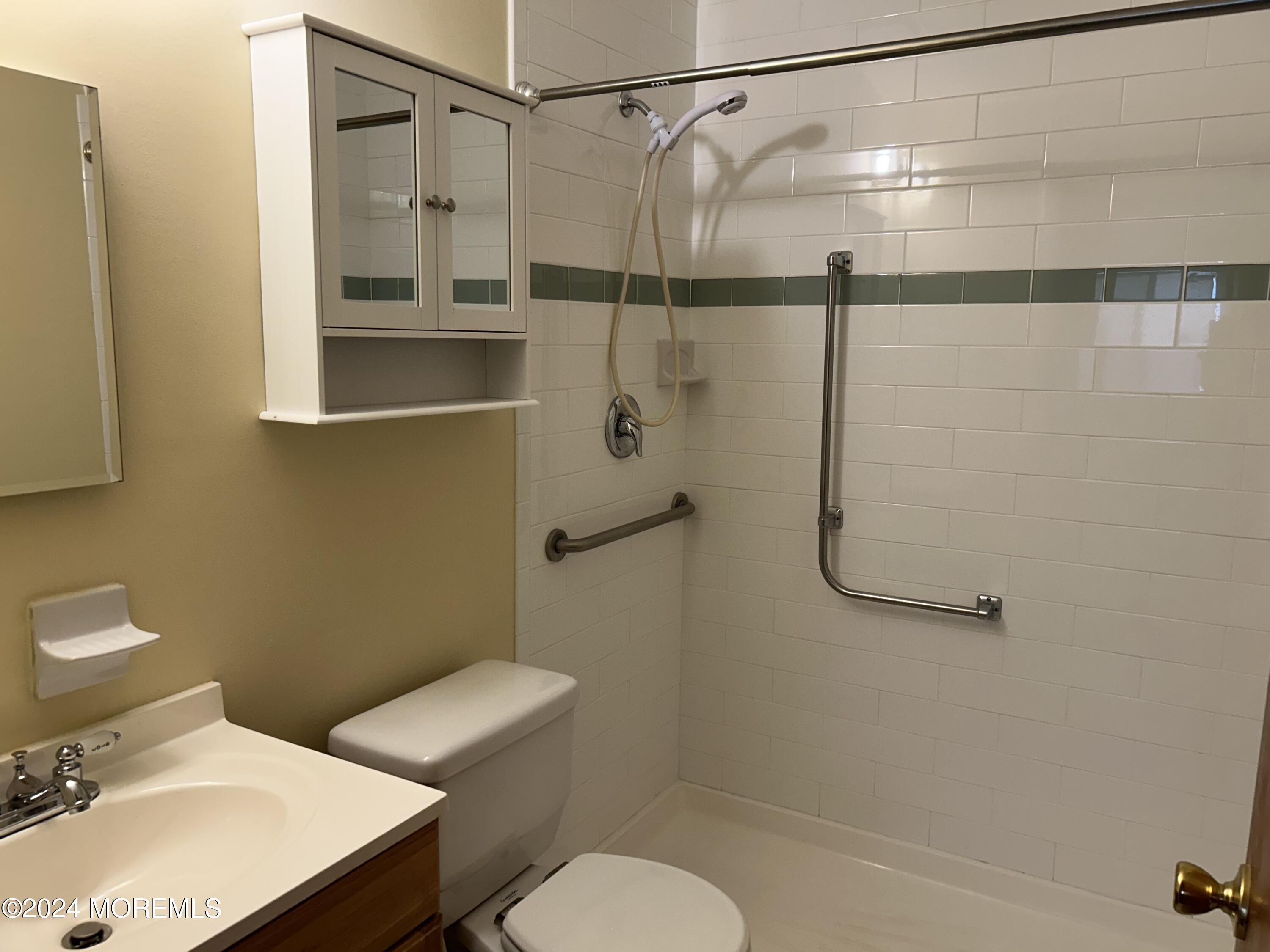 38 Eldorado Street Toms River, NJ 08757 - Photo 11 of 11 a bathroom with a sink toilet and shower