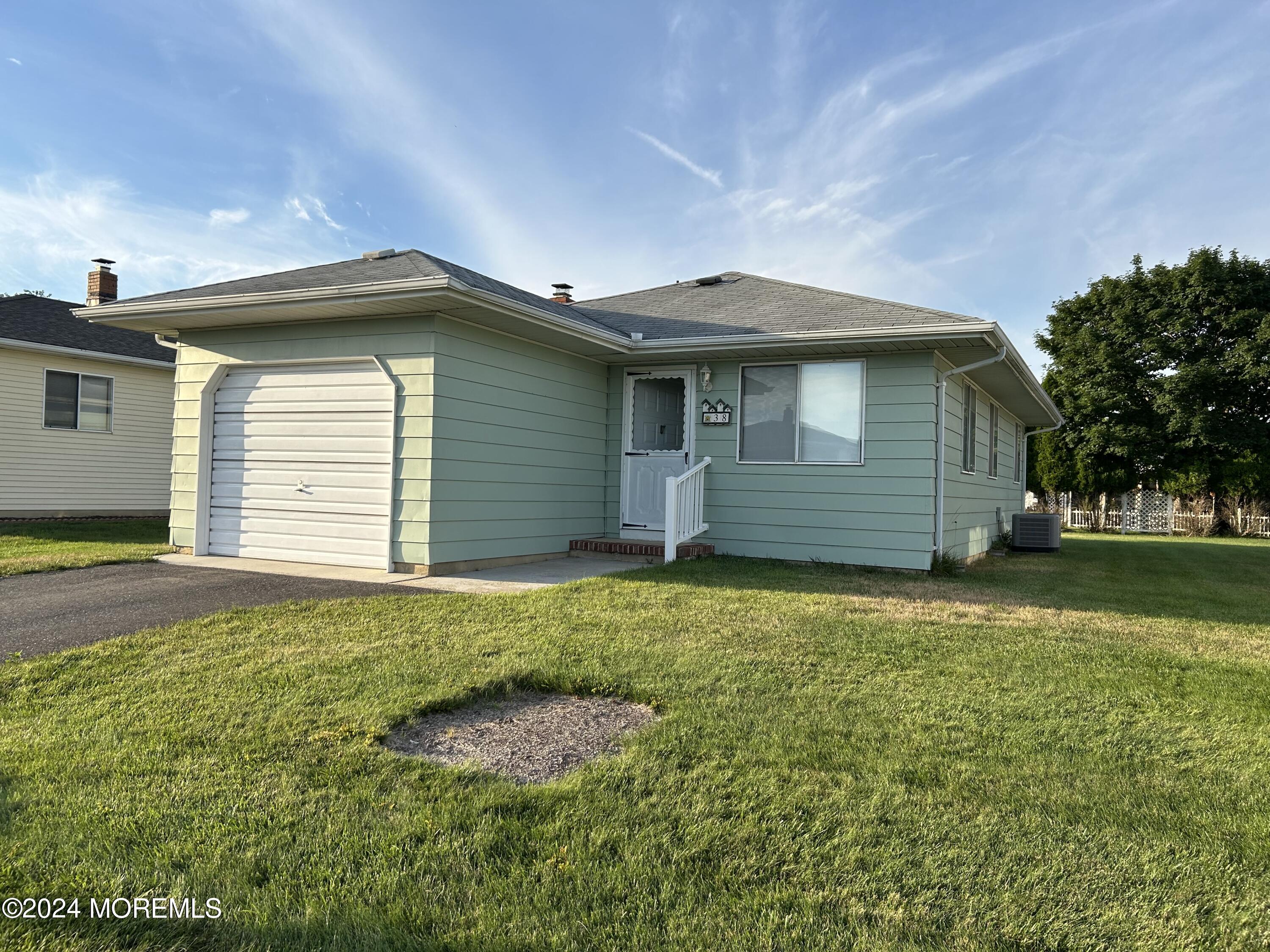 38 Eldorado Street Toms River, NJ 08757 - Photo 2 of 11 a front view of house with yard