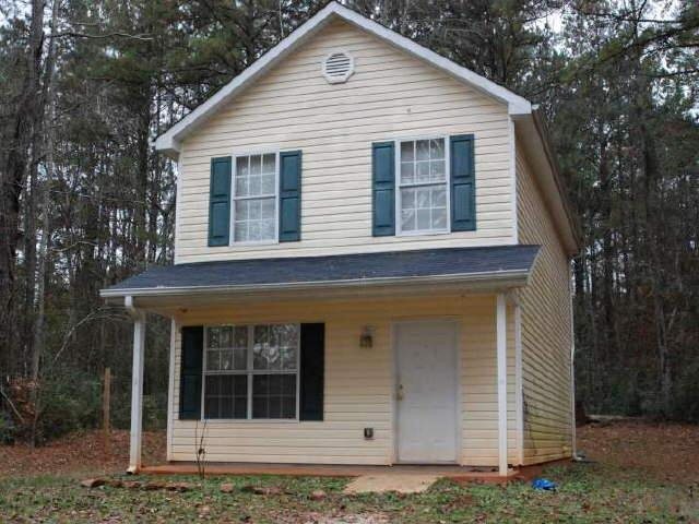 227 Southern Shores Road Jackson, GA 30233 - Photo 1 of 1 a front view of a house
