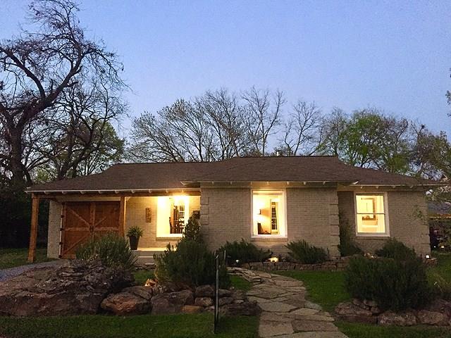 580 Peavy Road Dallas, TX 75218 - Photo 1 of 1 a front view of house with yard and green space
