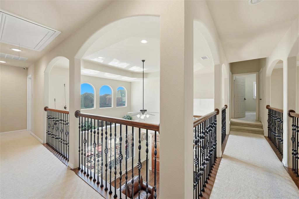 14875 Daneway Drive Frisco, TX 75035 - Photo 22 of 34 a view of a hallway with closet and stairs