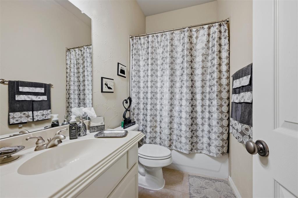 14875 Daneway Drive Frisco, TX 75035 - Photo 28 of 34 a bathroom with a sink toilet and shower