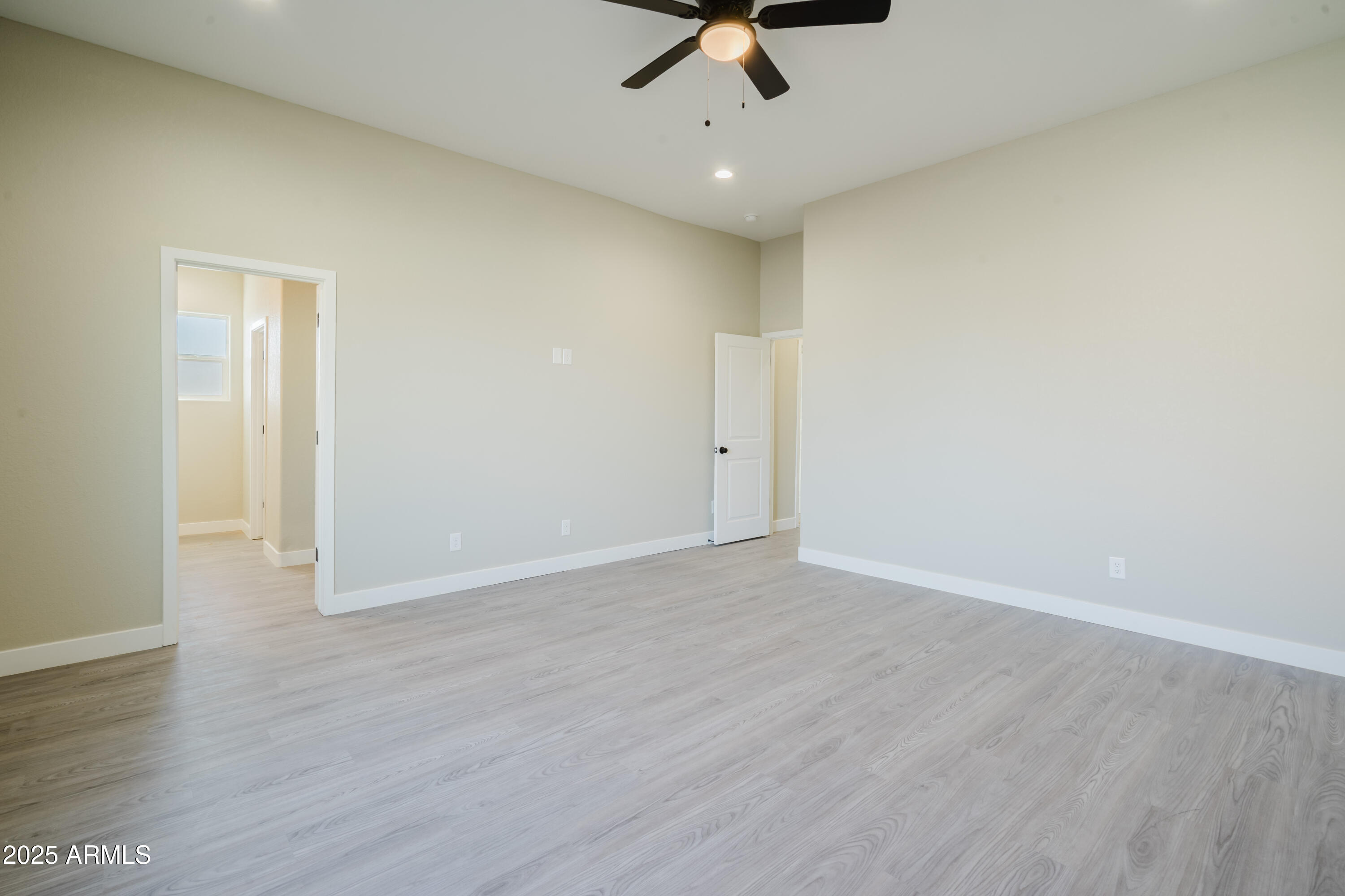14951 South Capistrano Road Arizona City, AZ 85123 - Photo 16 of 27 a view of a room with wooden floor