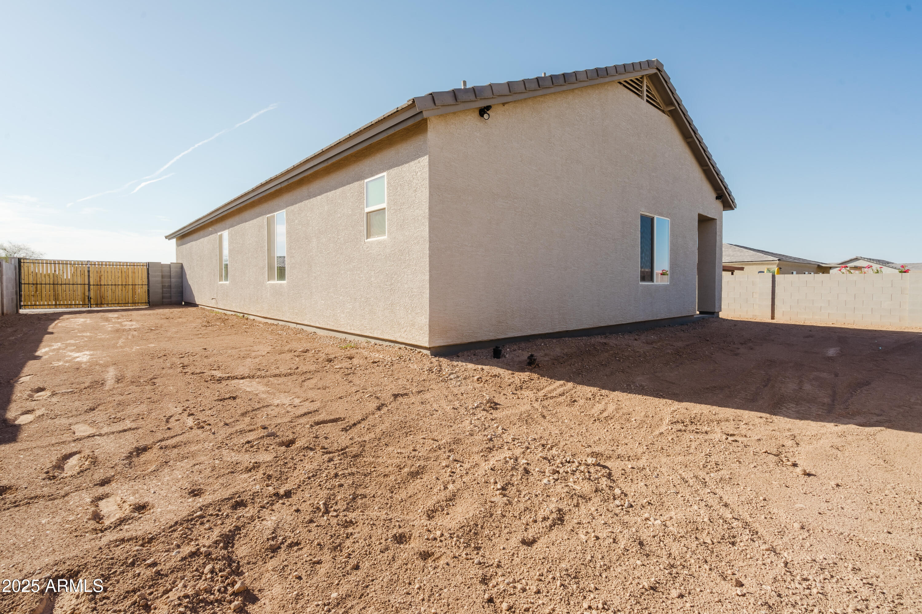 14951 South Capistrano Road Arizona City, AZ 85123 - Photo 25 of 27 a view of backyard of a house