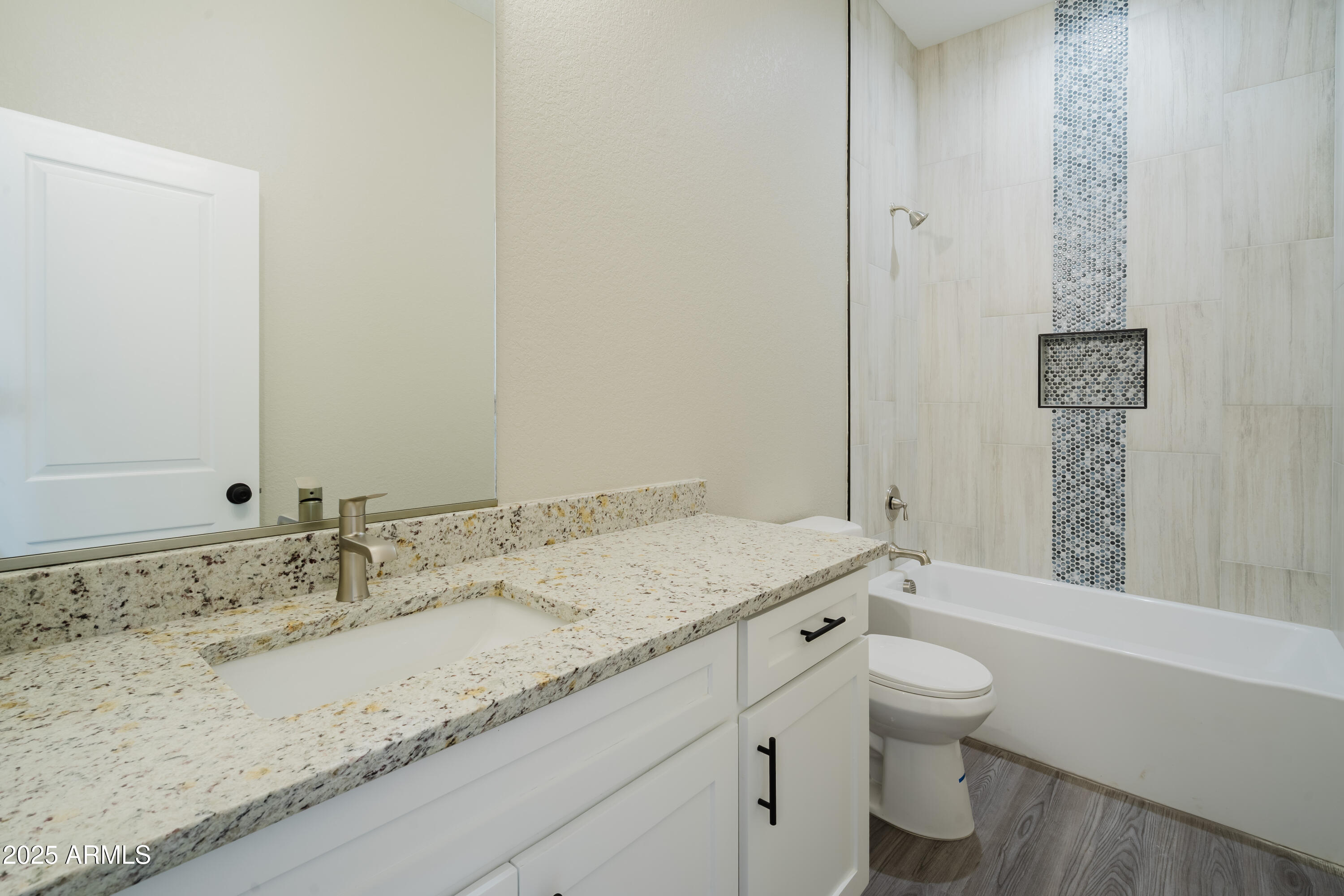 14951 South Capistrano Road Arizona City, AZ 85123 - Photo 9 of 27 a bathroom with a granite countertop sink mirror vanity and toilet