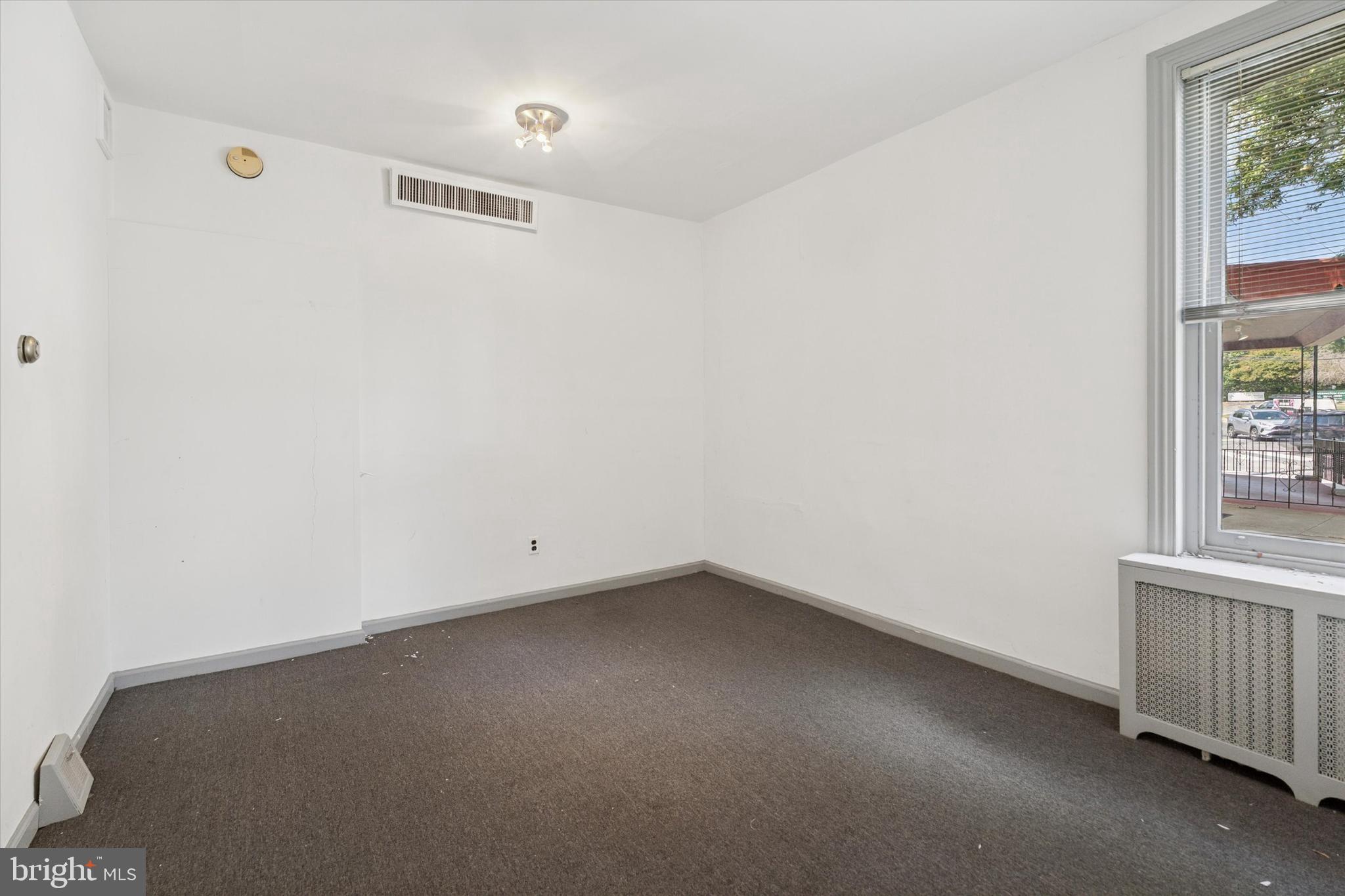 6232 Ridge Avenue Philadelphia, PA 19128 - Photo 8 of 33 an empty room with a window