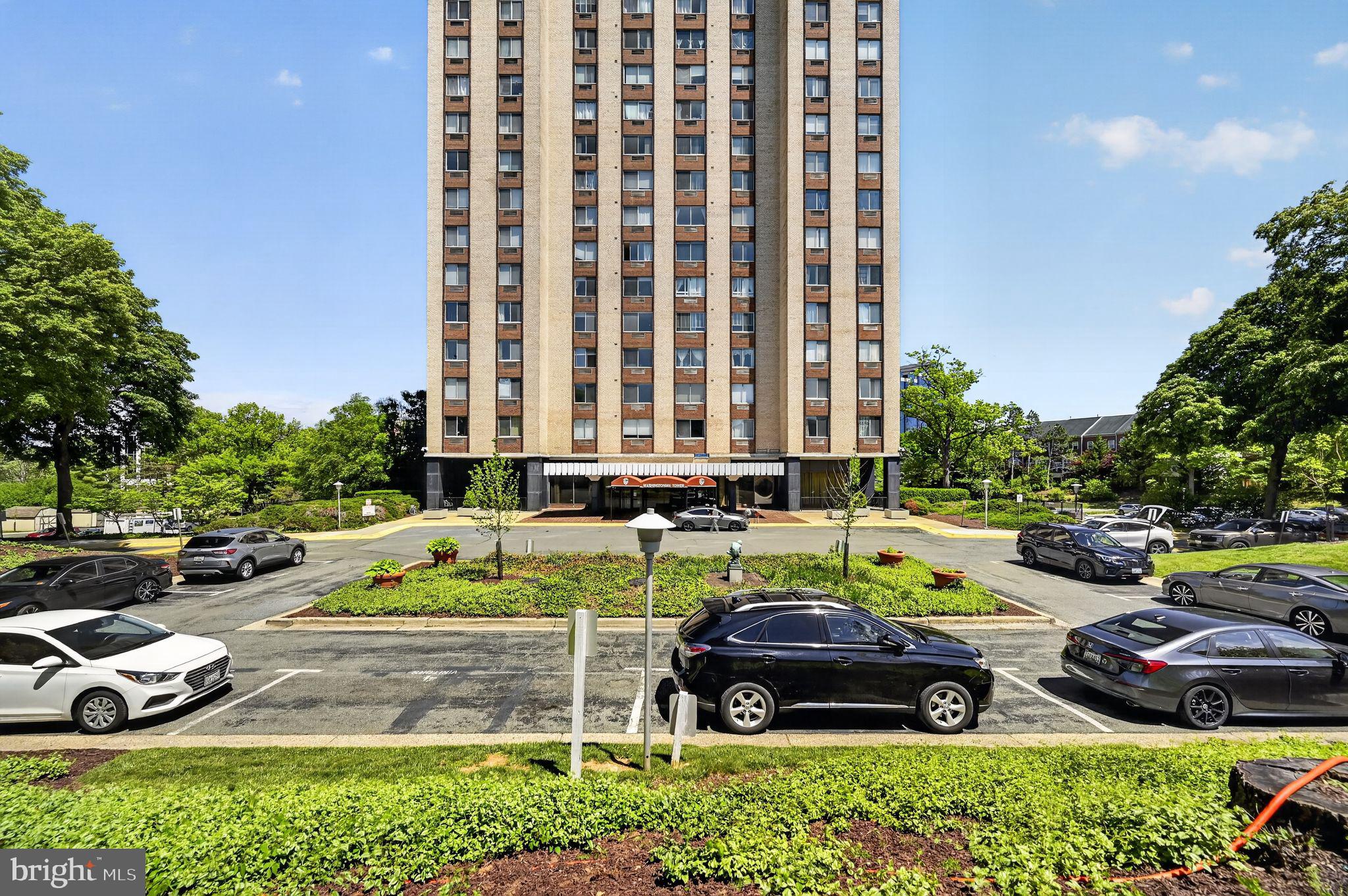 9701 Fields Road, Unit 200 Gaithersburg, MD 20878 - Photo 1 of 31 a view of a swimming pool with a patio