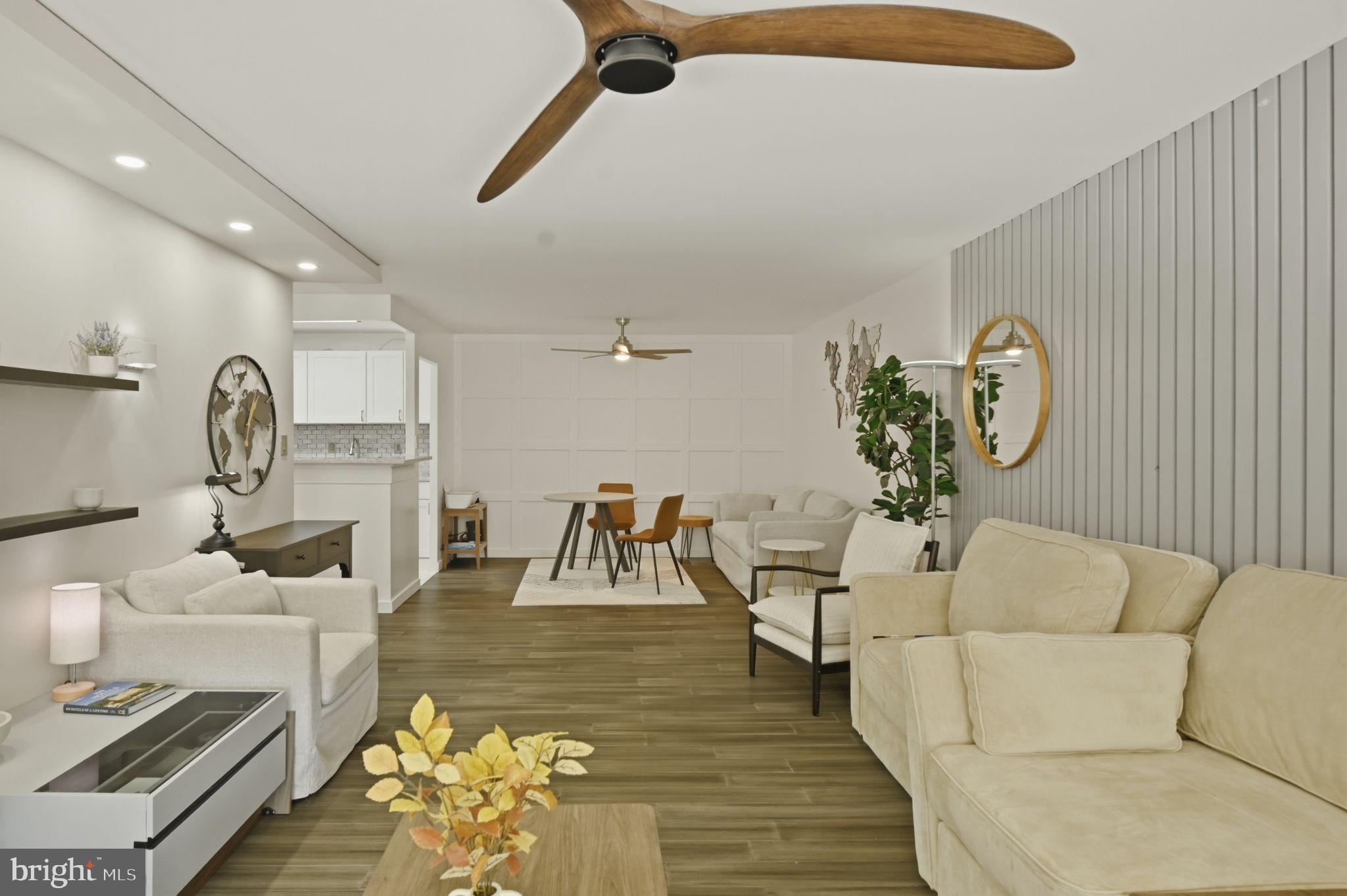 9701 Fields Road, Unit 200 Gaithersburg, MD 20878 - Photo 11 of 31 a living room with furniture