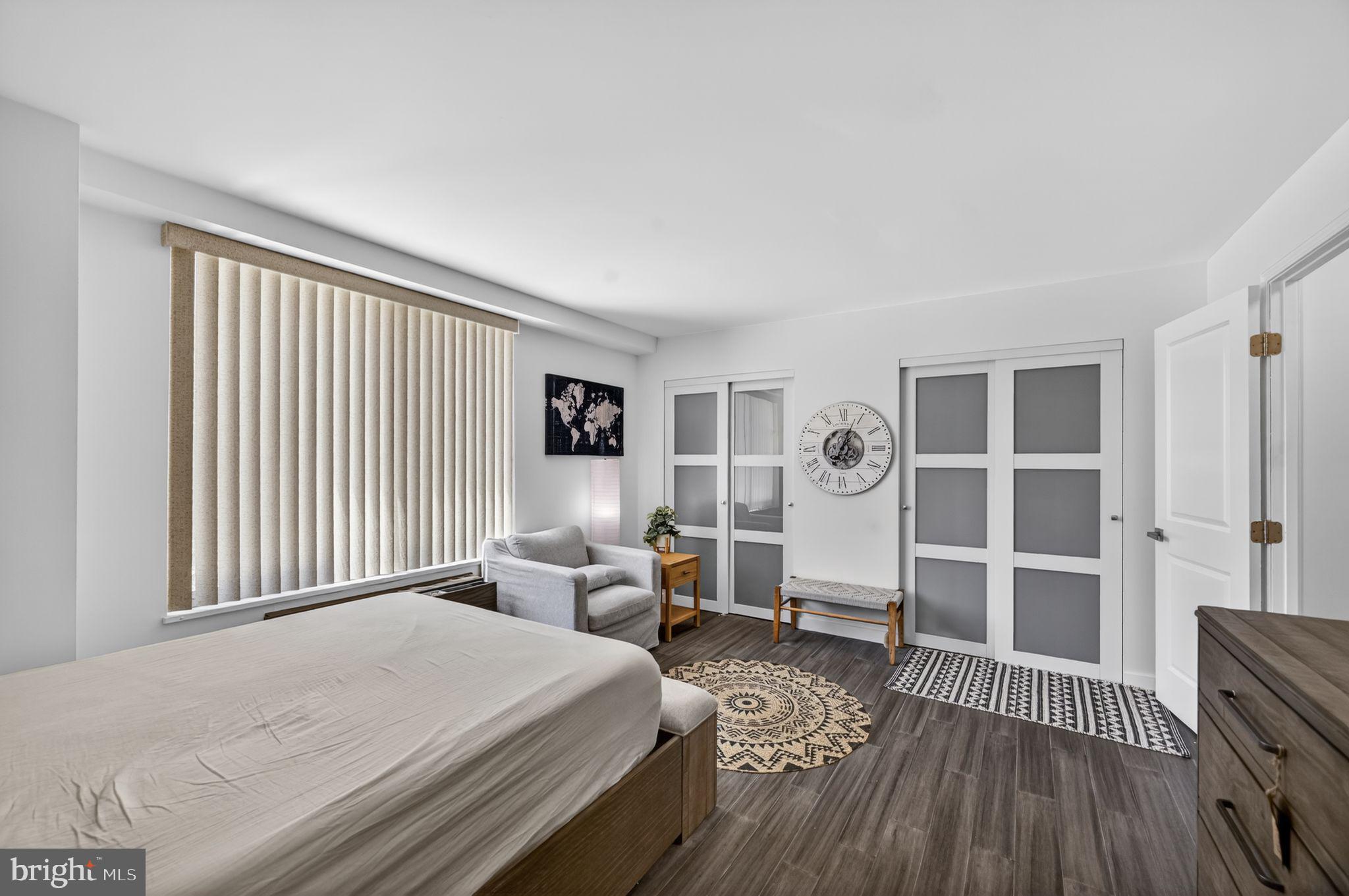 9701 Fields Road, Unit 200 Gaithersburg, MD 20878 - Photo 20 of 31 a bed room with a bed and a window