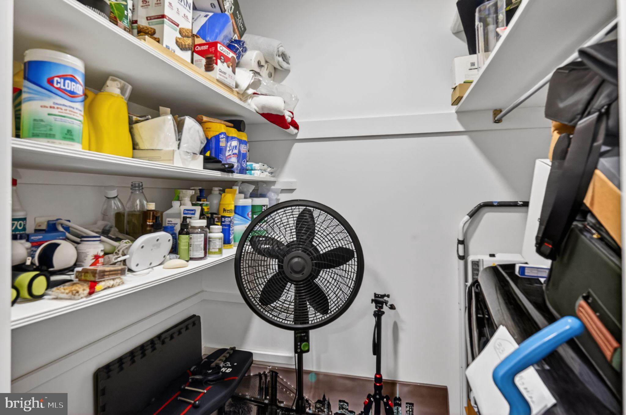 9701 Fields Road, Unit 200 Gaithersburg, MD 20878 - Photo 26 of 31 a storage room with washer and dryer