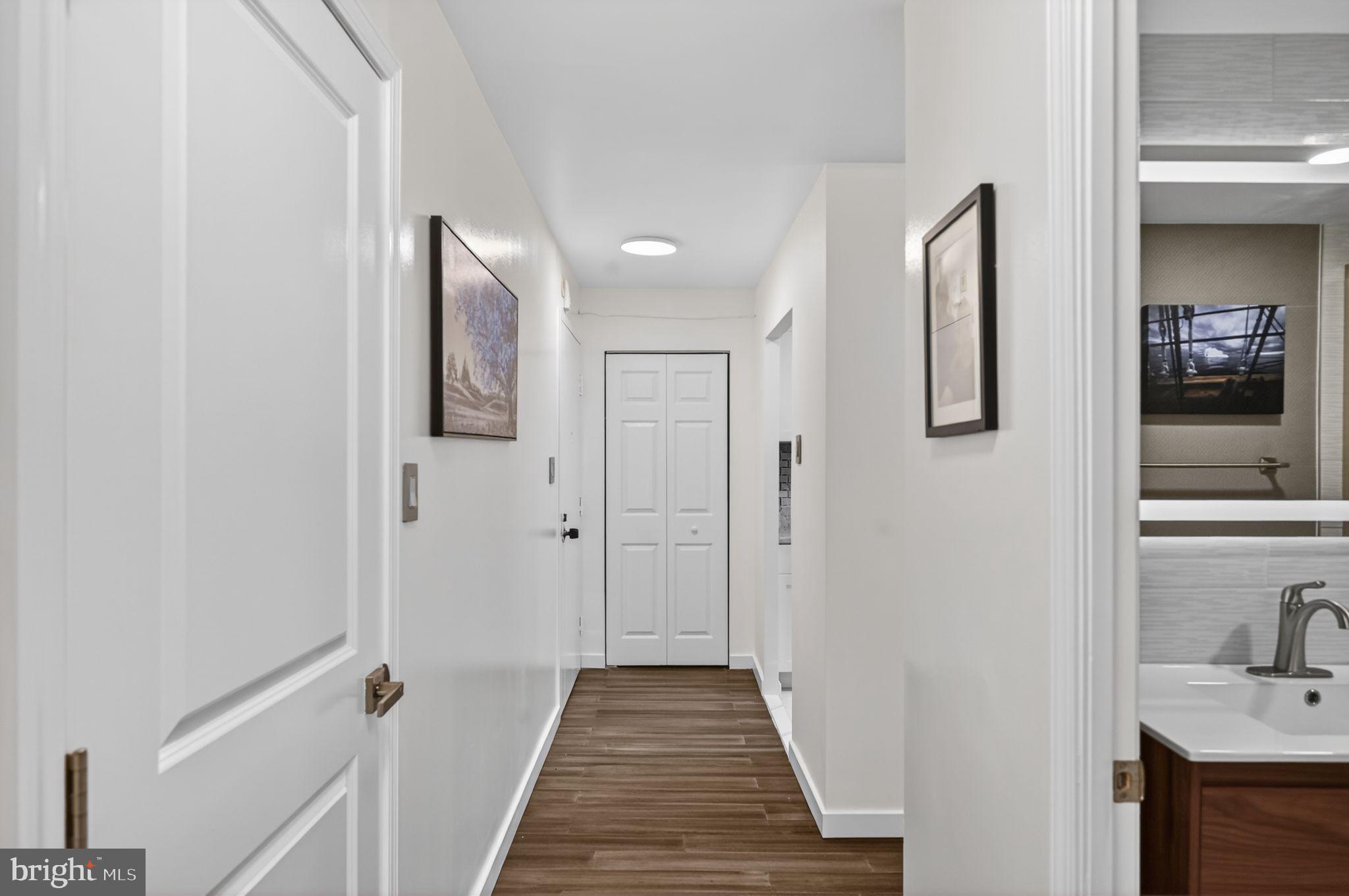 9701 Fields Road, Unit 200 Gaithersburg, MD 20878 - Photo 27 of 31 a view of a bathroom from the hallway