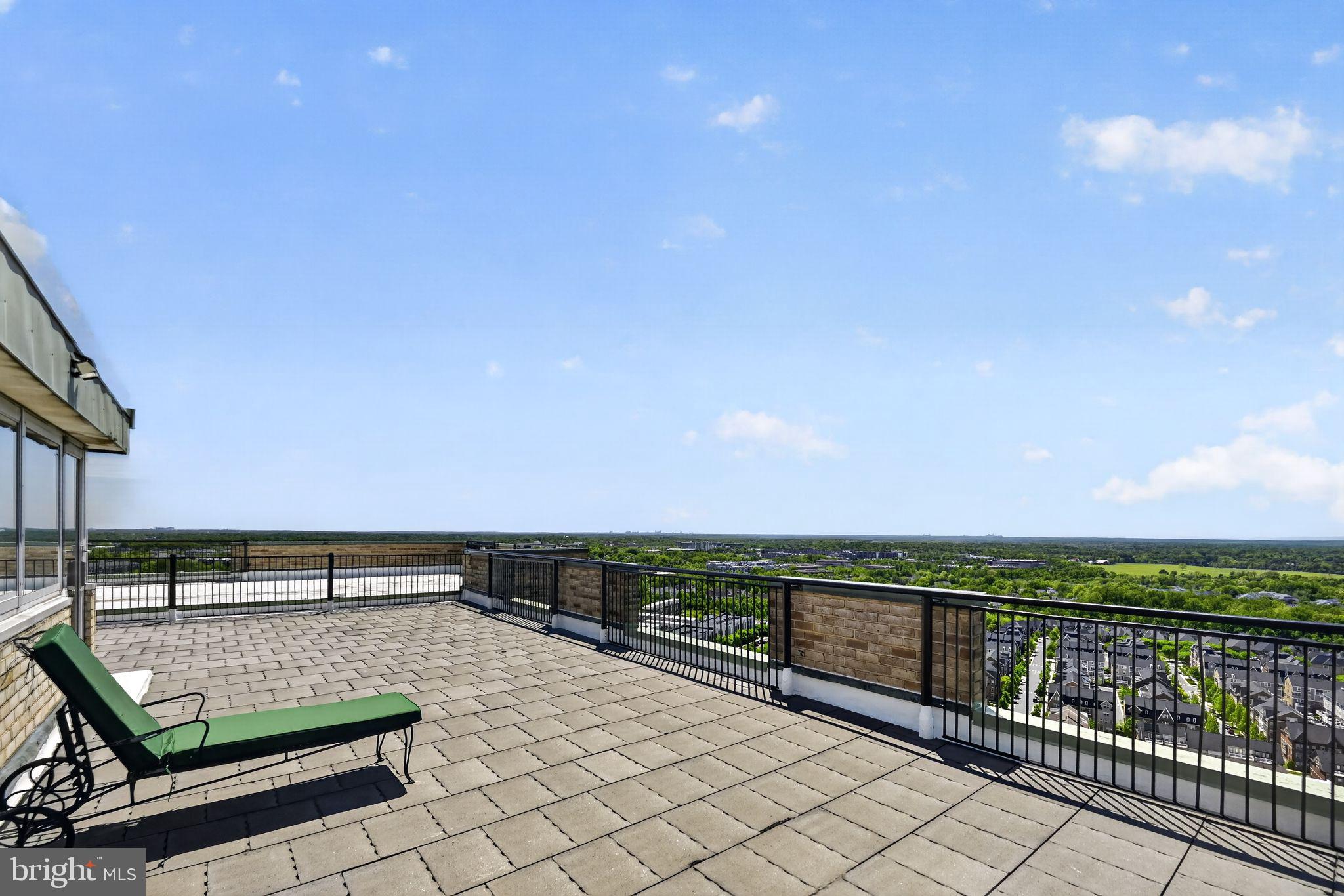 9701 Fields Road, Unit 200 Gaithersburg, MD 20878 - Photo 29 of 31 a view of a terrace with outdoor seating