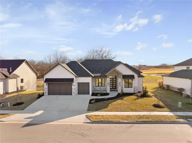 $1,089,000 | 703 Hampstead Drive, Raymore, MO 64083