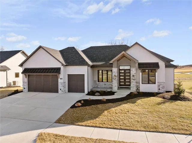 $1,089,000 | 703 Hampstead Drive, Raymore, MO 64083
