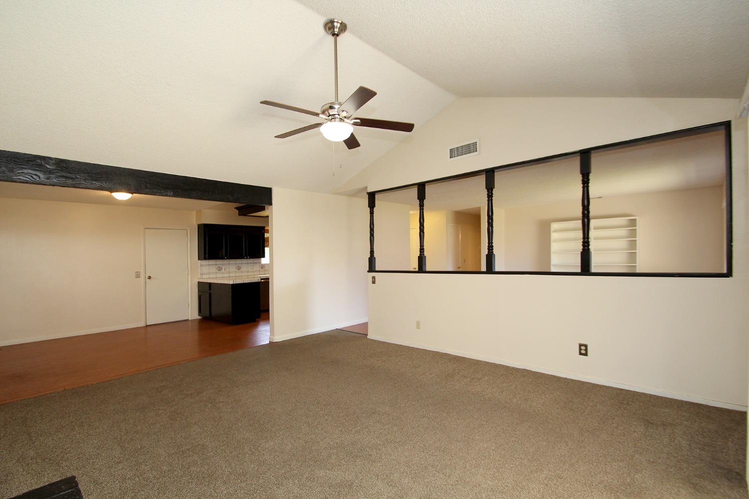 834 Fordham Avenue Clovis, CA 93611 - Photo 4 of 26 a view of an empty room with a window