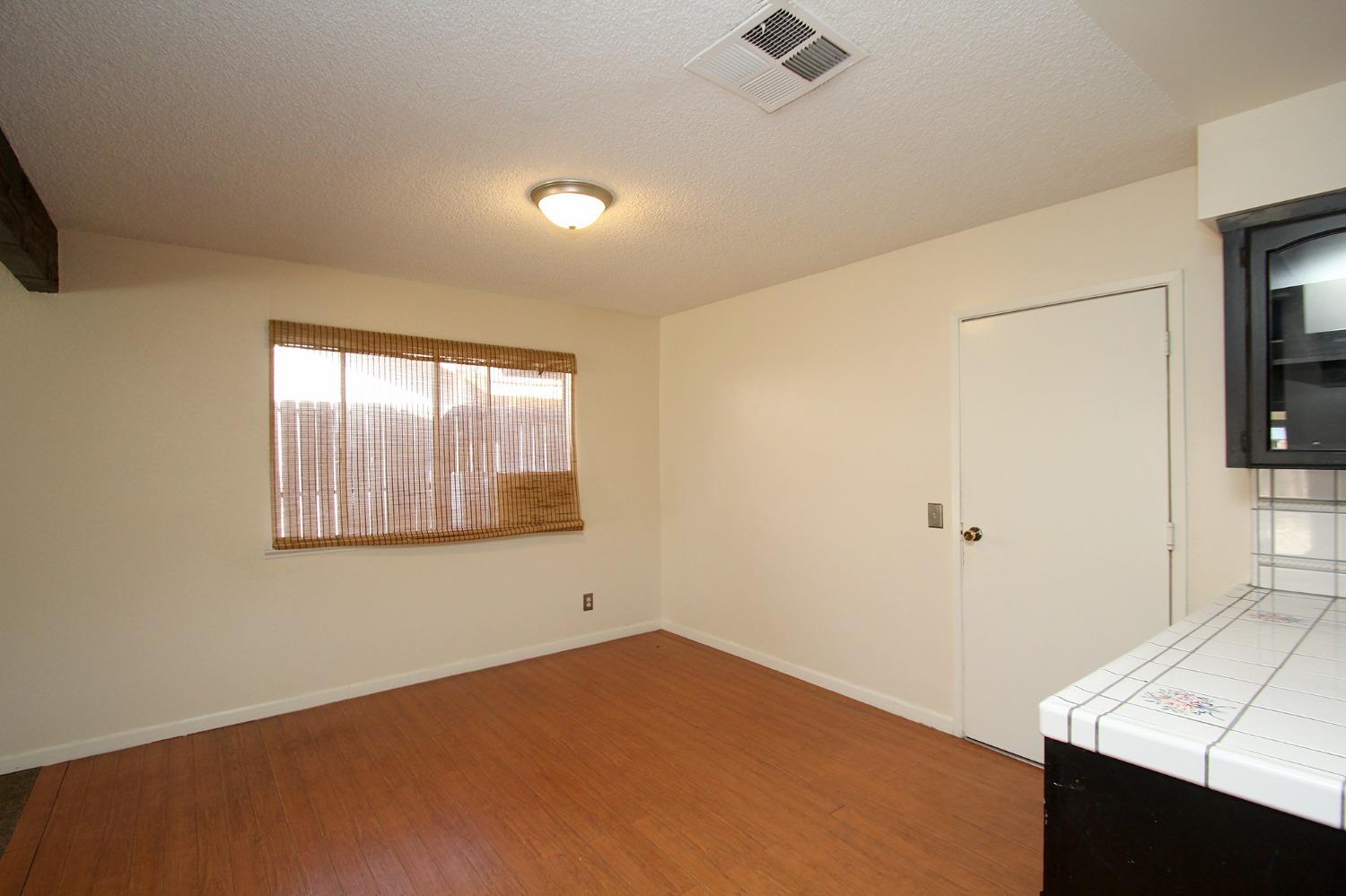 834 Fordham Avenue Clovis, CA 93611 - Photo 10 of 26 a view of an empty room with a window