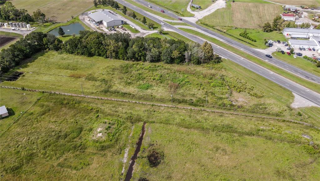 8140 State Road 207 Hastings, FL 32145 - Photo 20 of 41 a view of a yard with an outdoor space