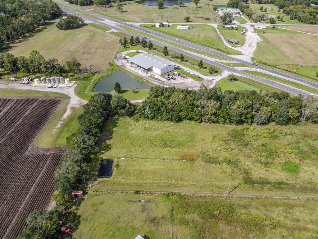 8140 State Road 207 Hastings, FL 32145 - Photo 22 of 41 a bathroom with a sink mirror and vanity