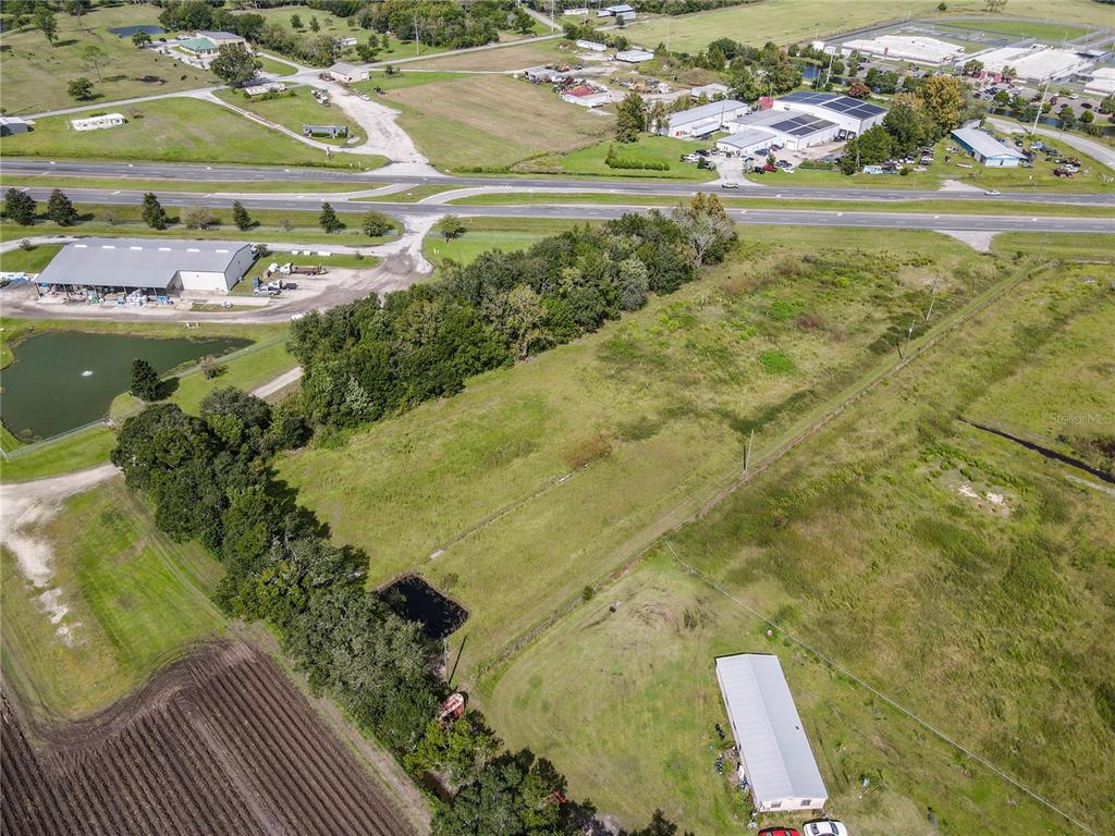 8140 State Road 207 Hastings, FL 32145 - Photo 23 of 41 a view of a swimming pool with a yard