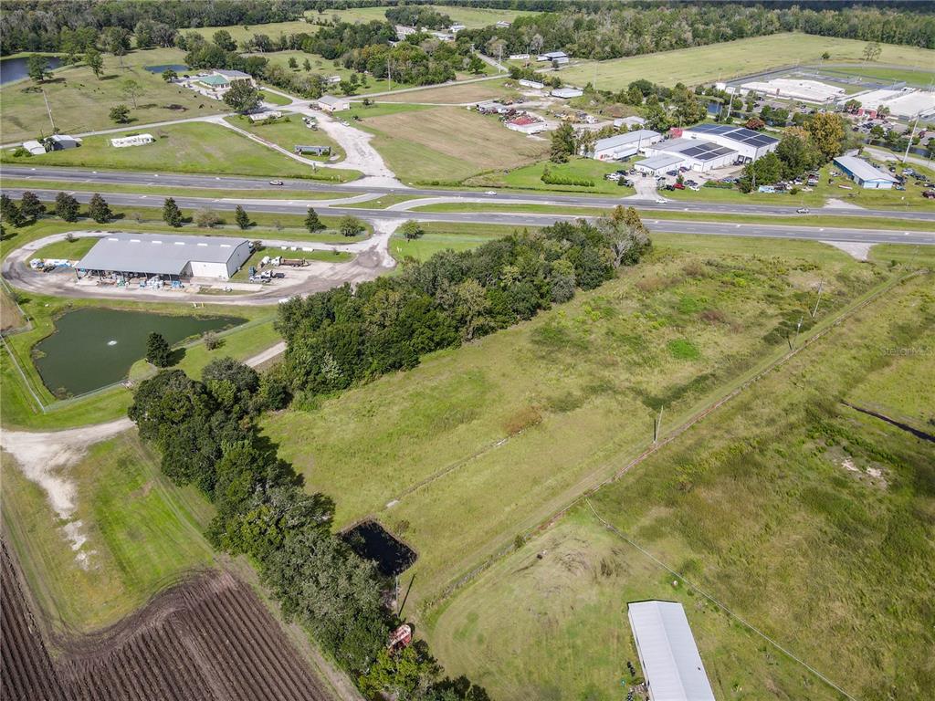 8140 State Road 207 Hastings, FL 32145 - Photo 24 of 41 a view of a swimming pool with a yard