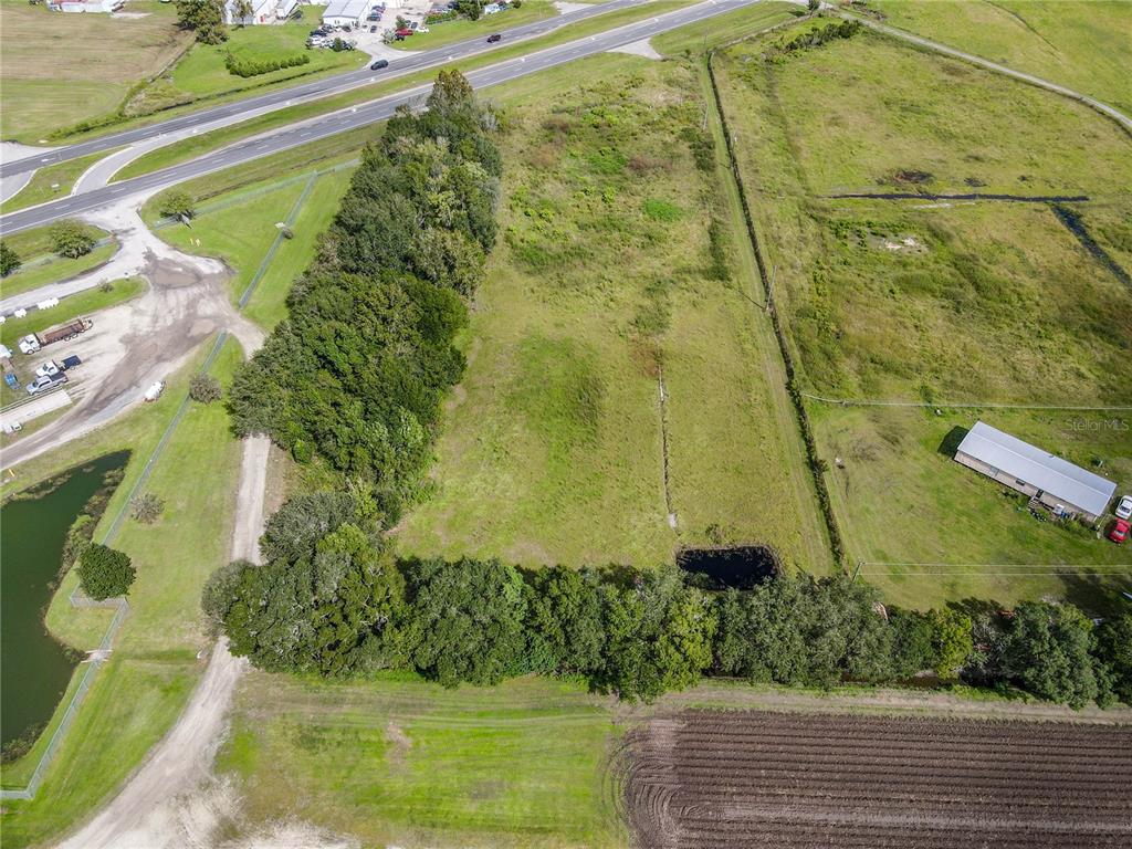 8140 State Road 207 Hastings, FL 32145 - Photo 27 of 41 an aerial view of a yard