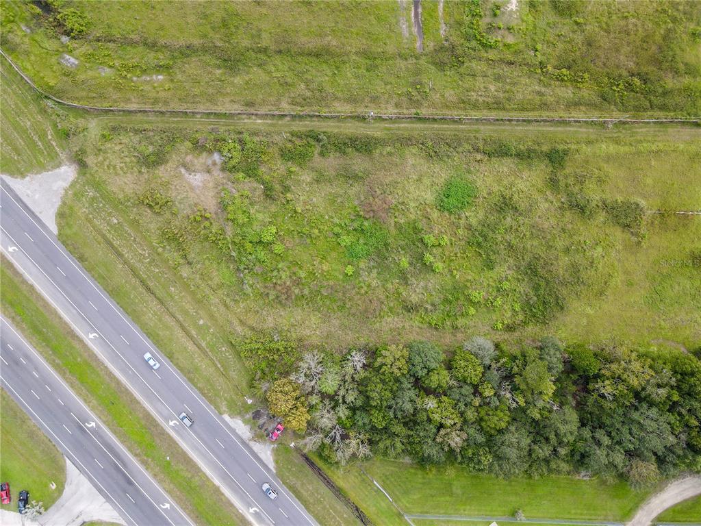 8140 State Road 207 Hastings, FL 32145 - Photo 41 of 41 a view of a yard with an outdoor space