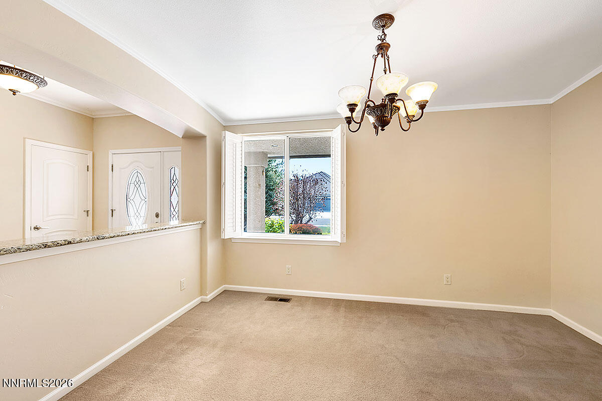 402 Chianti Way Dayton, NV 89403 - Photo 23 of 29 a view of an empty room with a window