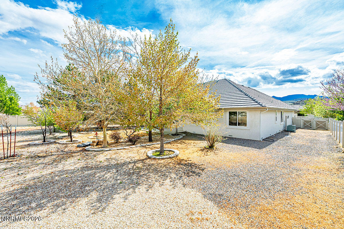 402 Chianti Way Dayton, NV 89403 - Photo 26 of 29 a view of a house with a snow in the yard