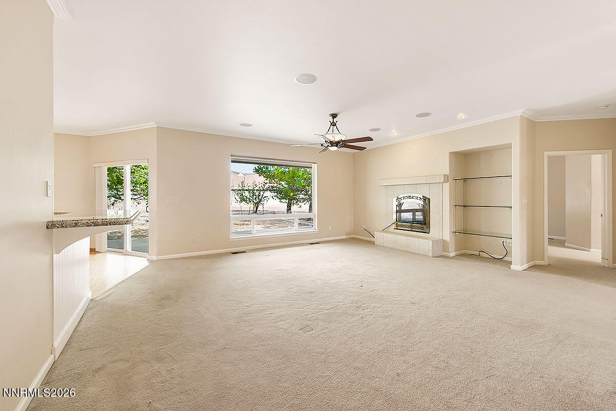 402 Chianti Way Dayton, NV 89403 - Photo 3 of 29 an empty room with furniture and a window