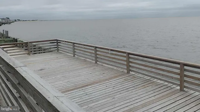 a view of wooden floor with staircase