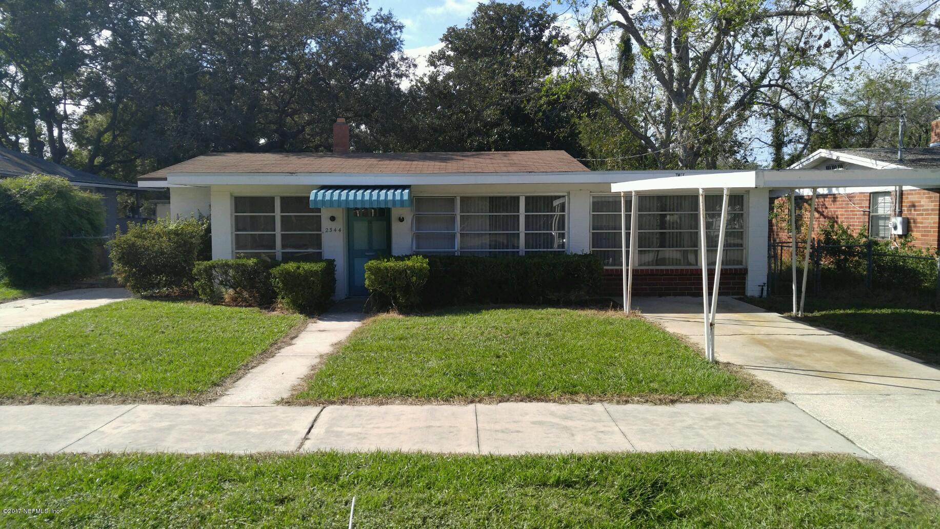 2344 Bayview Road Jacksonville, FL 32210 - Photo 1 of 6 a view of a house with a garden