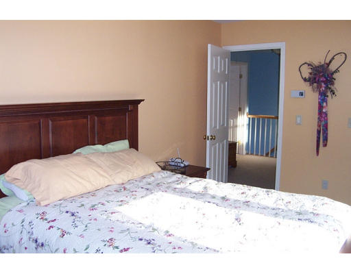 84 Walker Road Shirley, MA 01464 - Photo 24 of 30 a bedroom with a bed and a dresser