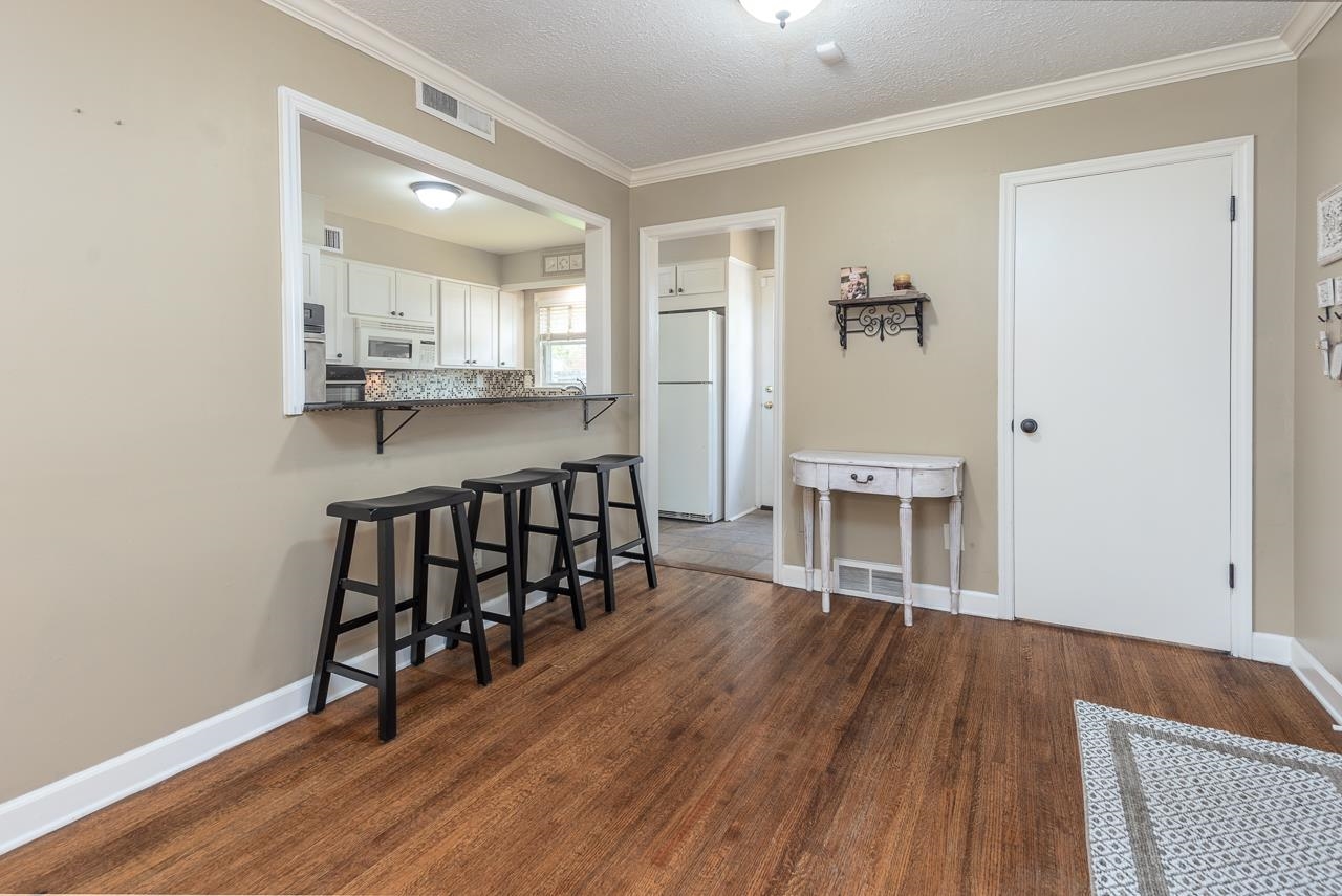 1650 Hayne Road Memphis, TN 38119 - Photo 16 of 33 a view of a kitchen with wooden floor and a window