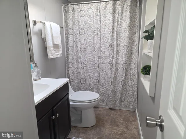 a bathroom with a sink and toilet
