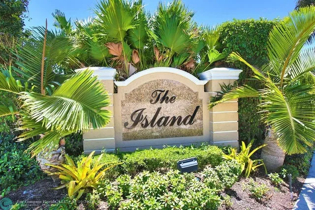 a sign that is sitting in front of a building